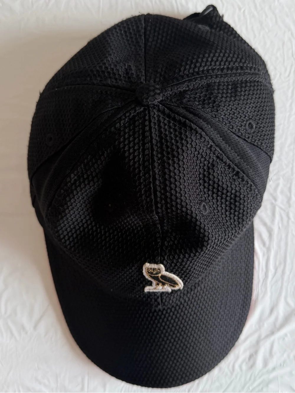 OVO Black Baseball Cap with Gold Owl Patch and Red Trim